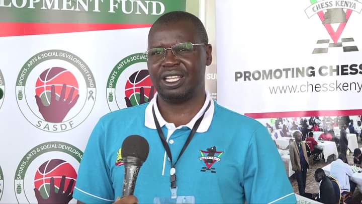 Bernard Wanjala (President of Chess Kenya) is pleased to be receiving this assistance. Photo by Chess Kenya