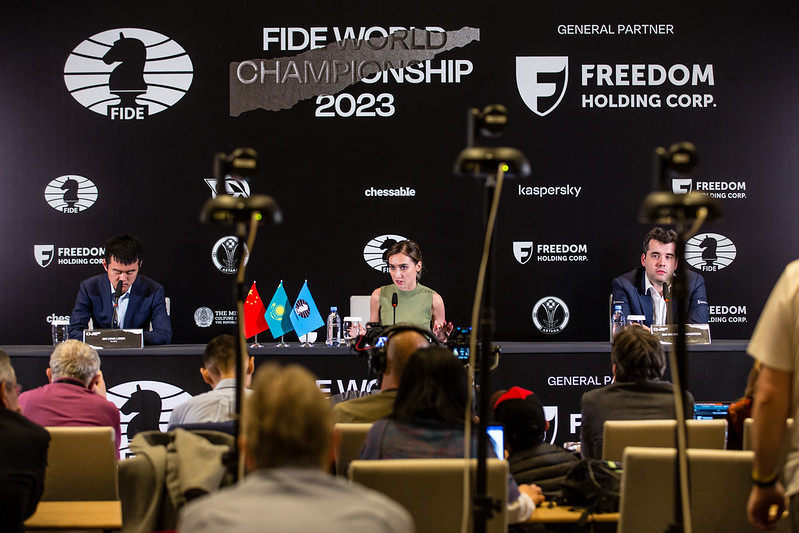 Ding presses, but match still tied. Photo by Anna Shtourman