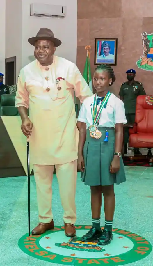Bayelsa State Govenor Douye Diri of with Quickpen after winning African under-10 with 9/10. Photo by Bayelsa State Government
