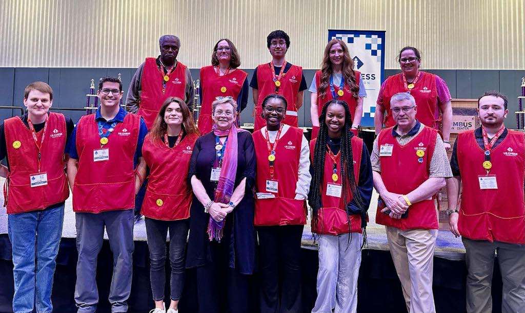 Shama Yisrael (front row, 3rd from right) as a Tournament Director
at one of the scholastic tournaments in Florida. Photo by U.S. Chess